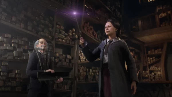 Shows two wizards in the hogwarts spell tome library